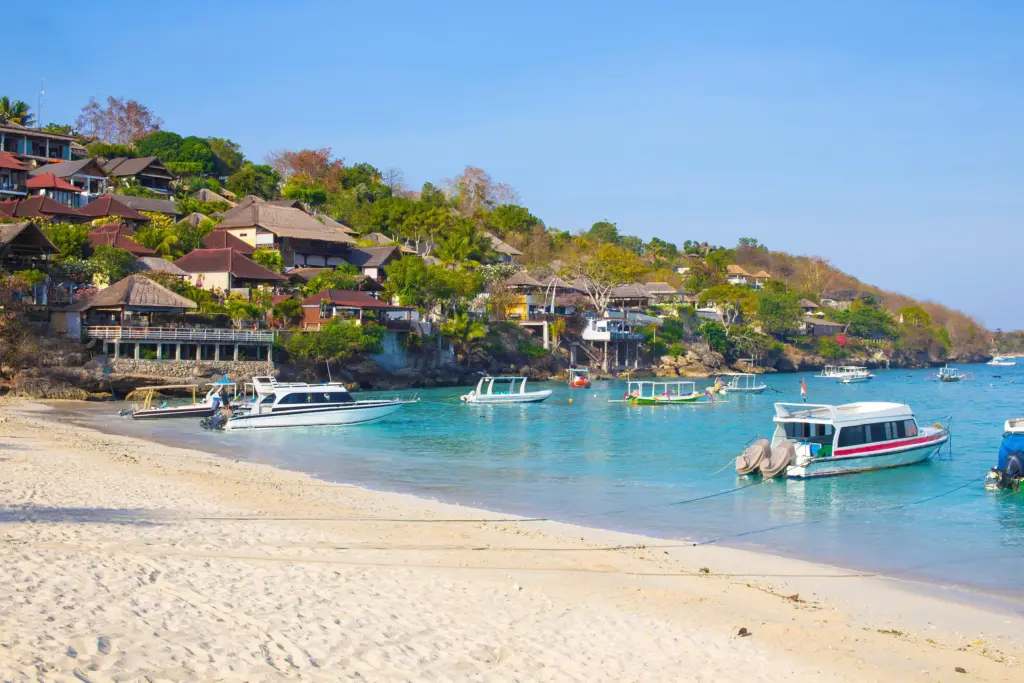 Fast boats anchored at Nusa Lembongan, showing Bali’s popular but risky transport option for island travel